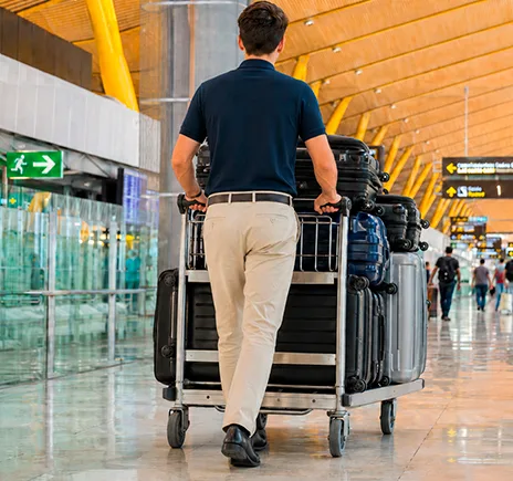 AirportPorter porter transporting luggage at Madrid-Barajas Airport